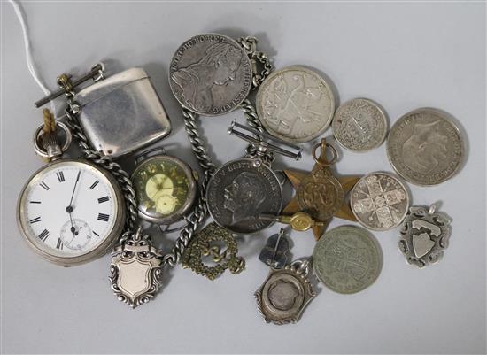 A pocket watch, a wrist watch, a silver vesta case and assorted coins.